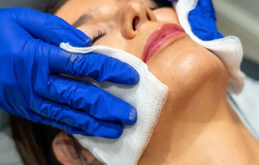 Woman preparing for her skin booster treatment.