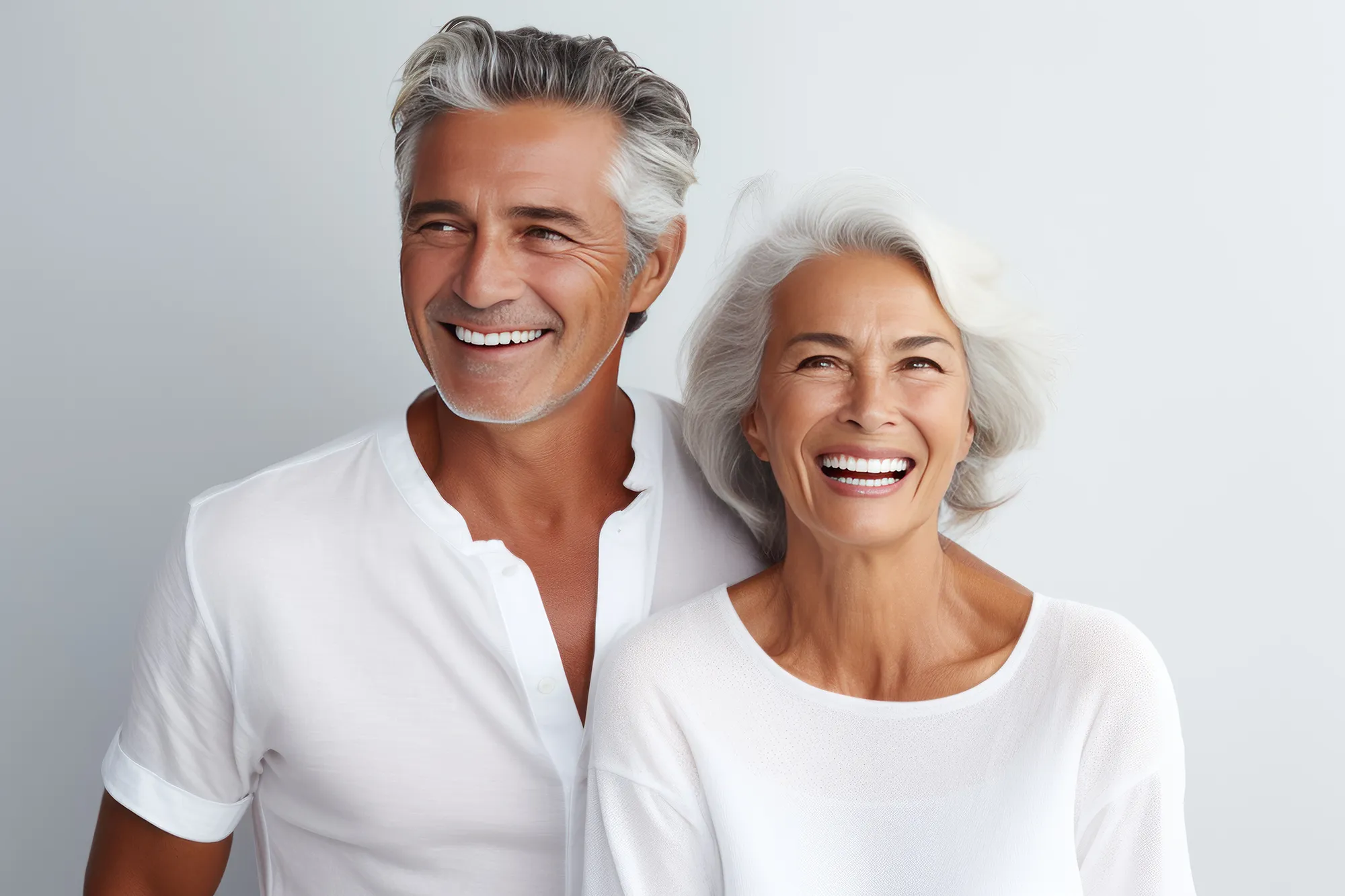 Older couple with great skin after treatments at Blemish Clinic in Lancashire